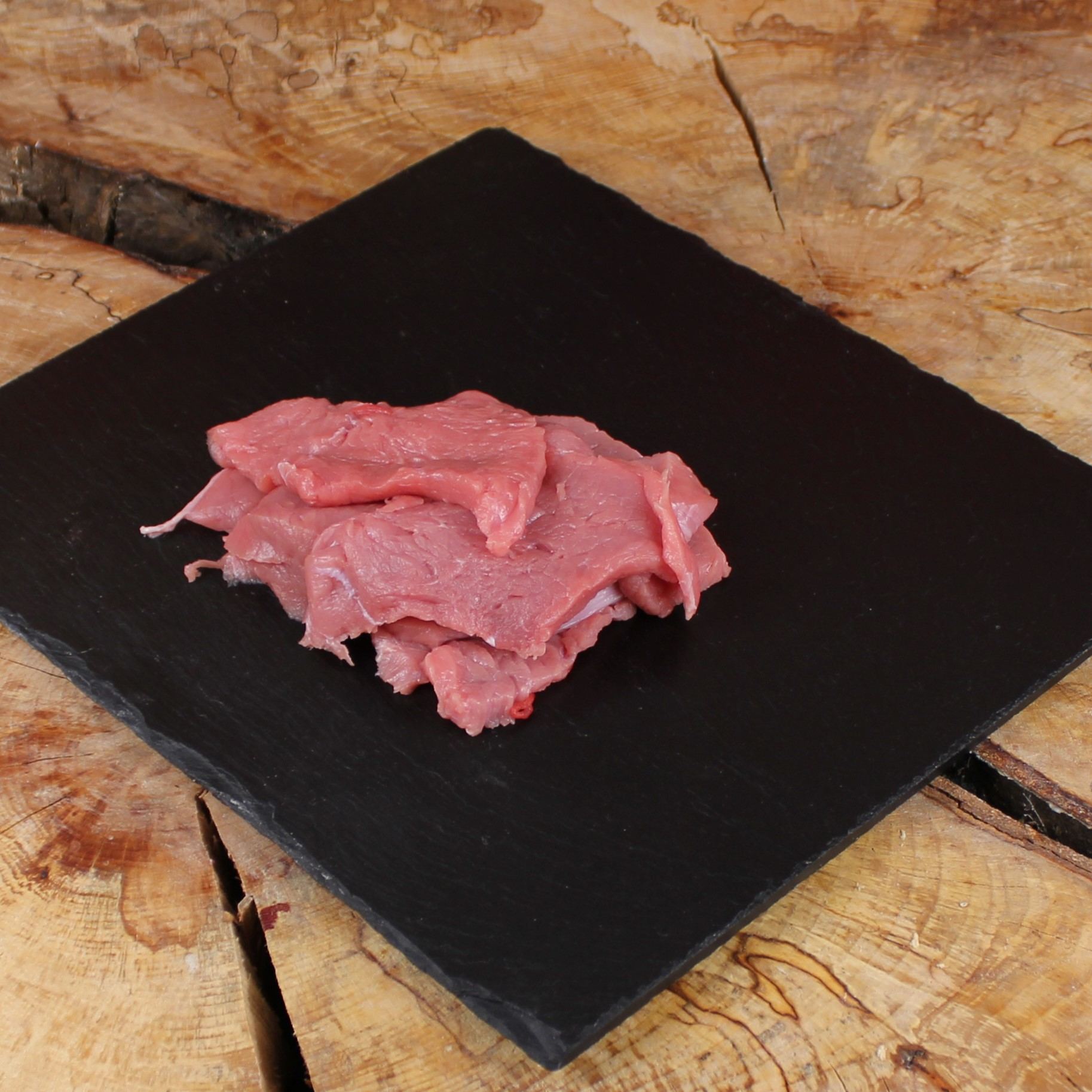 Bio Kalbsrücken auf Raclette oder Fondue geschnitten